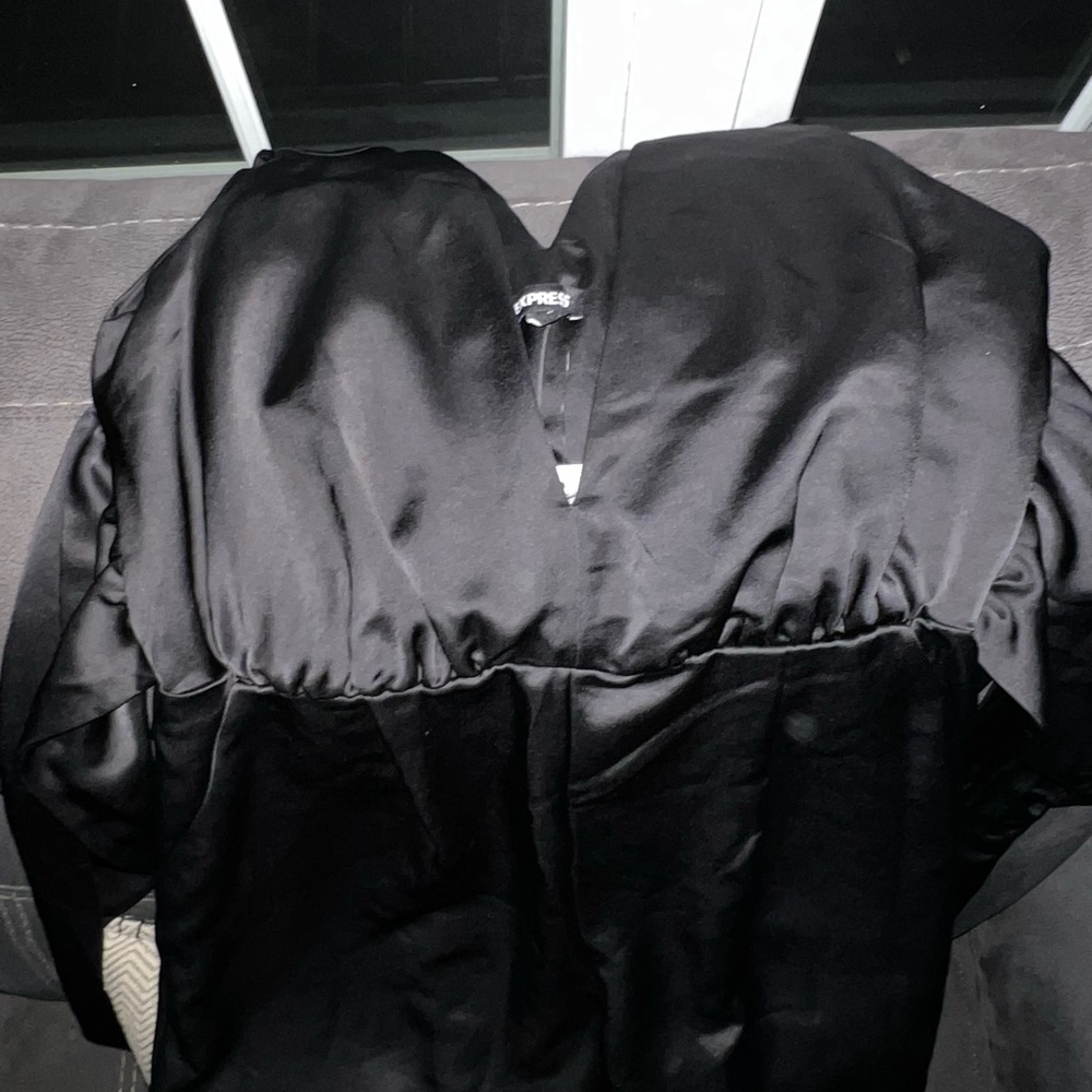 Women’s size medium Express black silk jumpsuit.